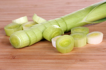 sliced ​​leek on wooden background
