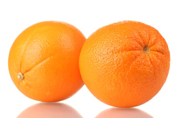 two ripe oranges isolated on white