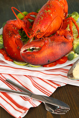 Red lobster on platter on table close-up