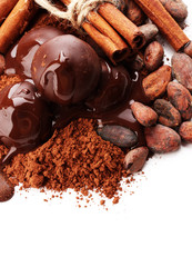 Composition of chocolate sweets, cocoa and spices, isolated