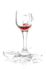Broken wineglass isolated on white