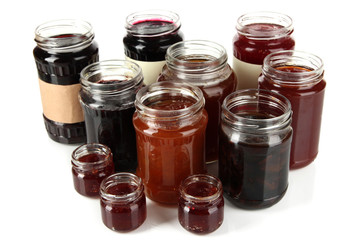 Tasty jam in banks isolated on white