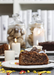 Chocolate cake on grey wooden table