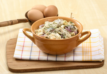 Fresh salad of fish and fresh vegetables. Healthy slow food, cou