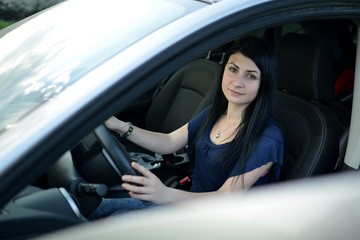 Obraz na płótnie Canvas Smiling female driver