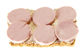 Brotscheibe mit Fleischwurstscheiben