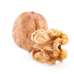 Walnut and a Kernel isolated on the white background, closeup