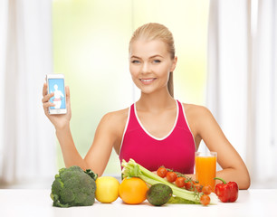 woman with fruits, vegetables and tablet pc