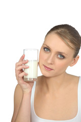 blonde woman drinking milk
