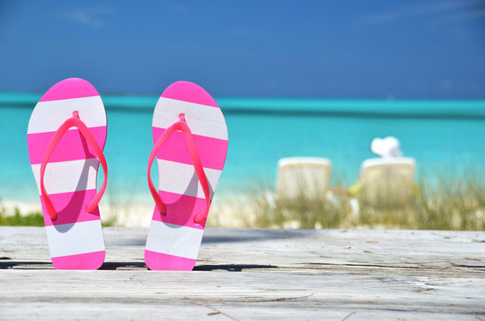 Flip-flops against ocean. Exuma, Bahamas