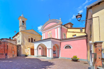 Obraz premium Two churches in town of barolo, Italy.