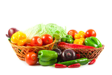 Fresh vegetables in basket isolated on white. Bio Vegetable.  Co