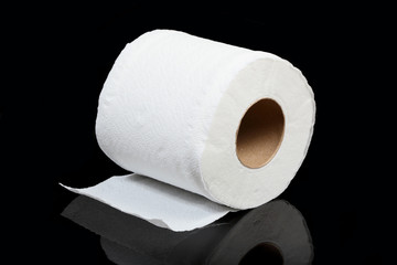 toilet paper isolated on black