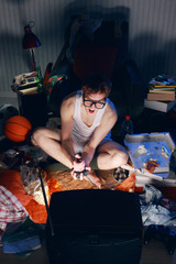 Gamer nerd playing video games on television