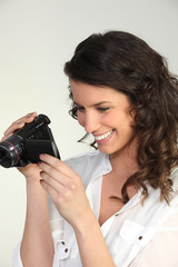 Woman using a camcorder
