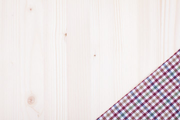 Tablecloth textile texture on wooden table background