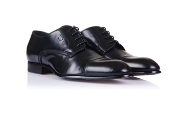 Fashion concept with male shoes on white