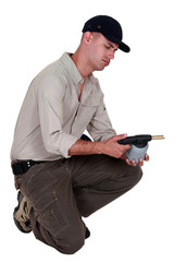 craftsman holding a welding torch