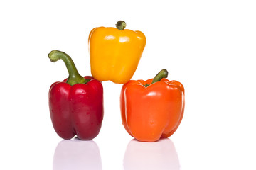 Red, yellow, and orange peppers.