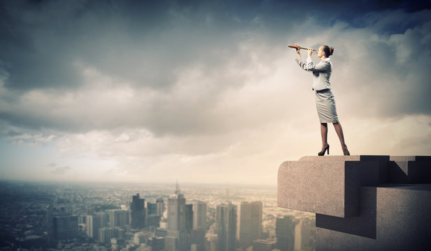 Business Woman With Telescope