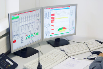 Displays in control center at factory
