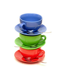 Set of colorful cups on white background