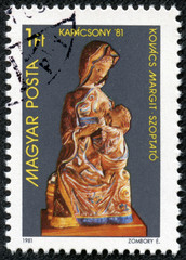 sculpture of Mary nursing the infant Jesus by Margit Kovacs