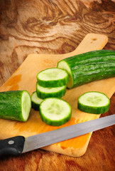 slices of cucumber from professional knife in studio