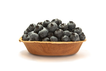 Blueberries on a plate  isolated on white