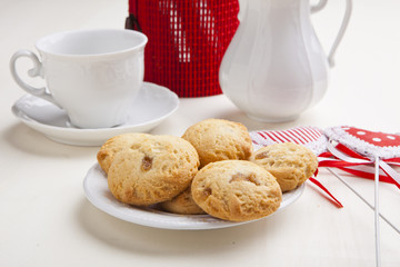 delicious apple biscuits on wooden table with heart decorations