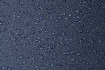 Drops of water on  waterproof cloth