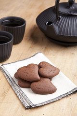 delicious chocolate heart shape biscuits with tea