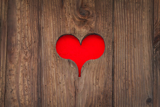 Cut out old wooden red heart shape
