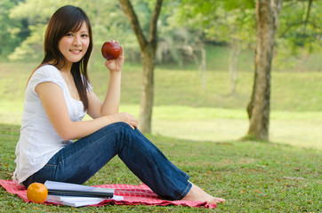 A portrait of a asian chinese race college student at campus