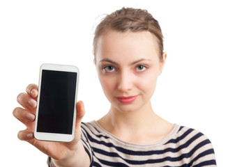 Young blond woman showing mobile phone