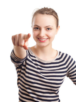 Young blond woman pointing with finger