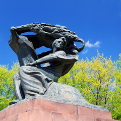 Frederic Chopin monument in the Royal Baths Park. Warsaw city center, Poland. Polish musician, composer, virtuoso pianist of the Romantic era. Sightseeing, landmark, culture, classical music