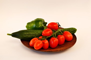 Vegetables on wooden plate