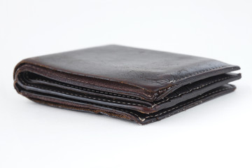 A brown wallet isolated on white