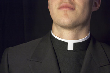 Close-up of Priest collar - obrazy, fototapety, plakaty