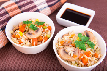 Rice with vegetables and mushrooms with soy sauce