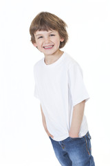 Obraz premium Young Happy Boy Smiling Hands in Pockets