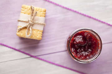 Fresh baked biscuits and red fruit jam