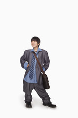 Boy dressed up as businessman