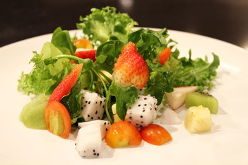 fruit salad with fresh strawberries and kiwi