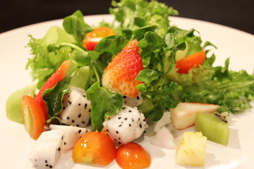 fruit salad with fresh strawberries and kiwi