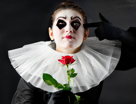 woman mime with red rose