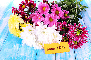 Bouquet of beautiful chrysanthemums on table close-up