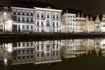 Naklejka premium Reflections of medieval buildings in a canal in Ghent