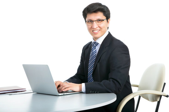 Happy business man with laptop
